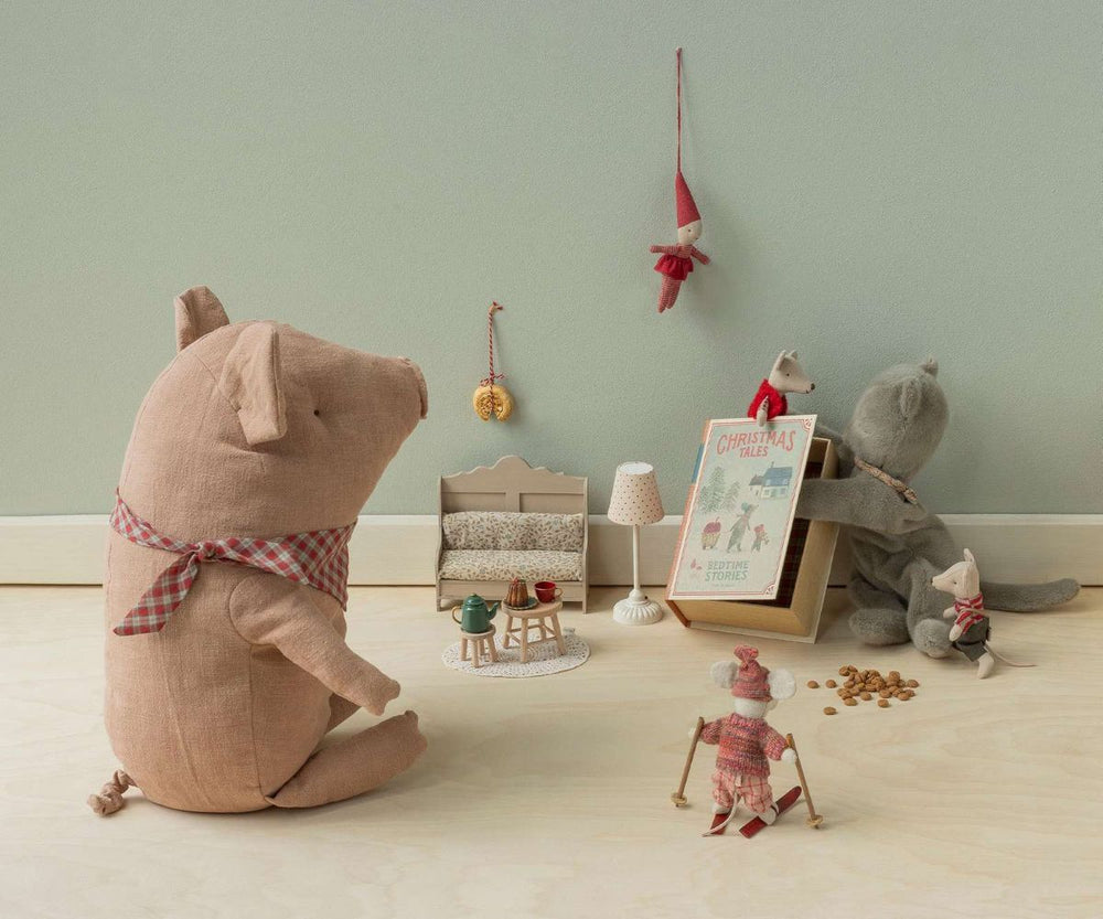 Maileg big truffle pig plush toy styled wiht other holiday Maileg items. 