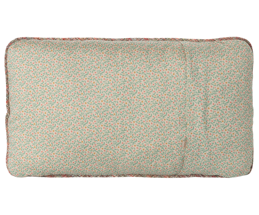 Back of Maileg unicorn cushion in a soft berry fabric
