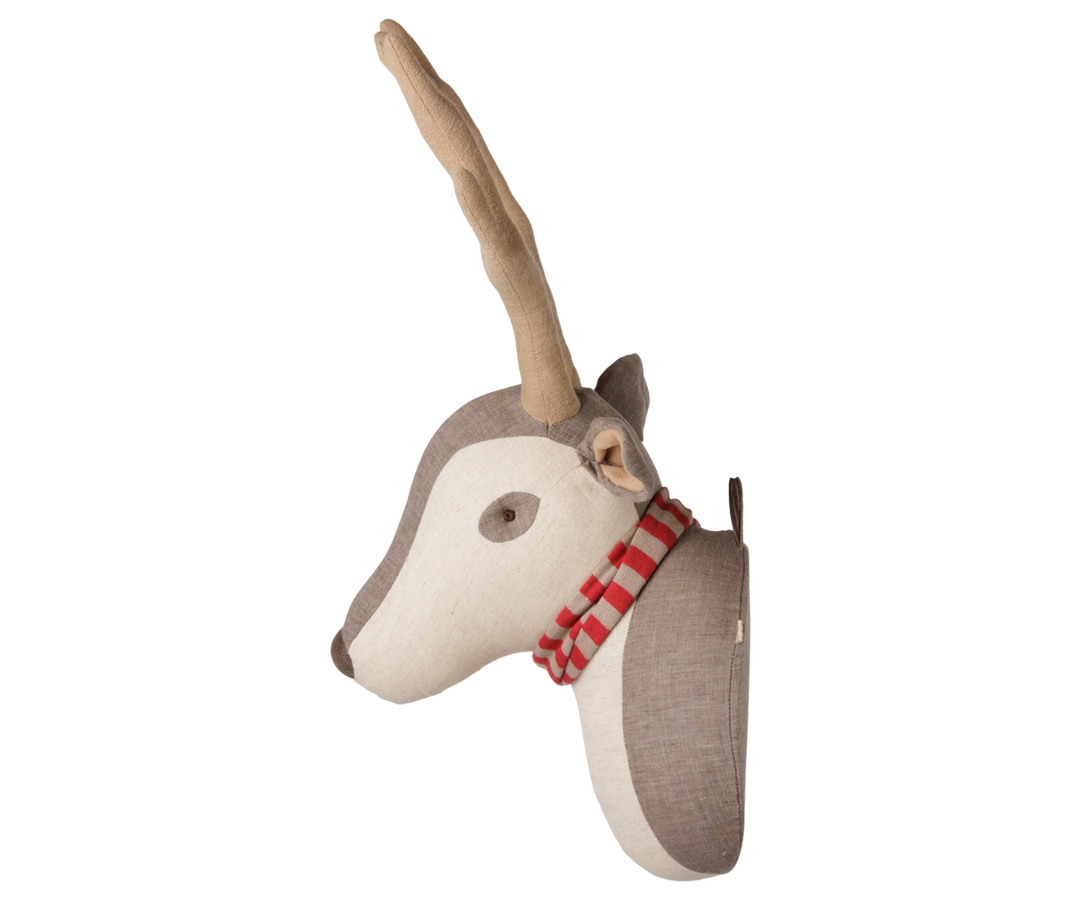 Side profile of Maileg reindeer wall trophy with long fabric antlers and striped scarf