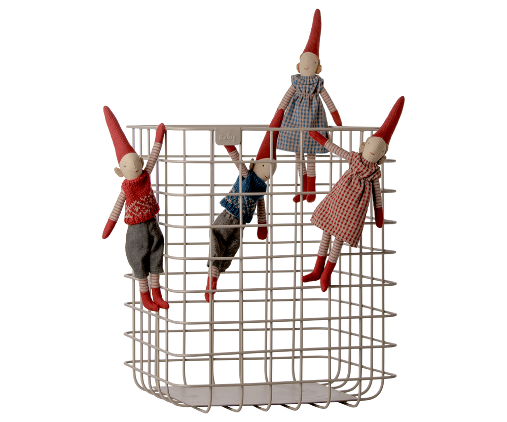 Maileg Christmas pixy elves displayed together in a wire basket, featuring traditional Scandinavian holiday outfits