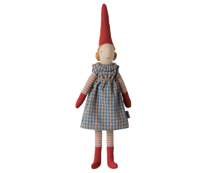 Maileg Christmas Pixy girl doll wearing a blue checkered dress, striped stockings, red mittens, and a tall red hat. 