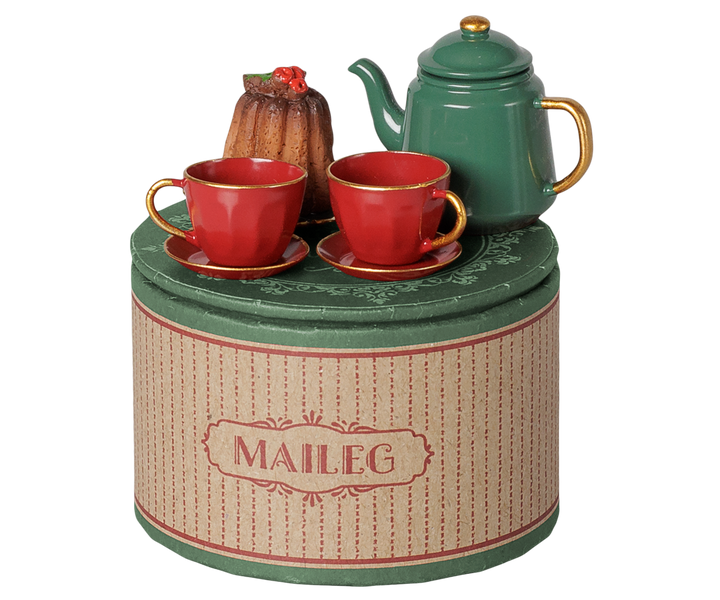 Maileg Christmas mouse tea party set displayed on top of its decorative round storage box. 