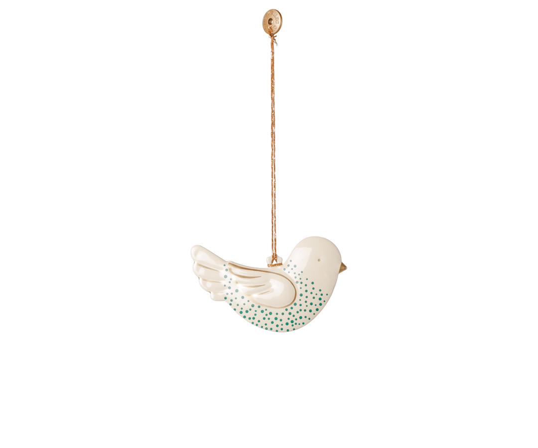 White Maileg metal bird Christmas ornament with hand-painted gold details and green dots and hanging string. 