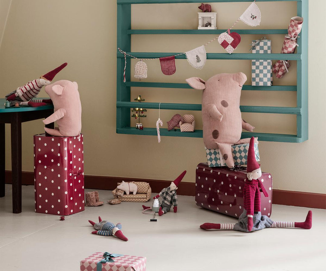 Maileg Christmas pixy displayed in a festive Scandinavian-inspired holiday setting with miniature Christmas decorations.