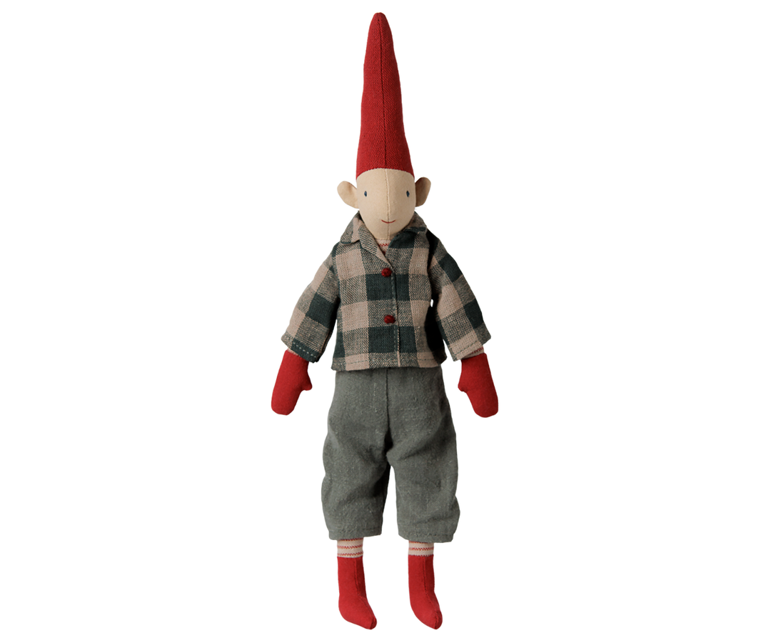 A Maileg pixy boy size 2 wearing a plaid shirt, pants, red mittens, red boots, and a red hat. 