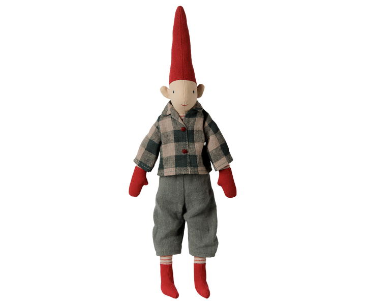 A Maileg pixy boy size 2 wearing a plaid shirt, pants, red mittens, red boots, and a red hat. 