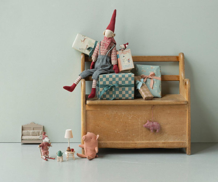 Maileg Christmas Pixy elves arranged in a festive holiday display with miniature furniture and Scandinavian Christmas decorations.
