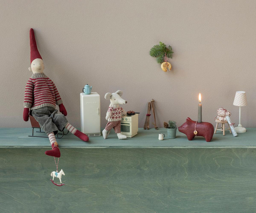 Maileg rocking horse Christmas ornament displayed with festive holiday decorations