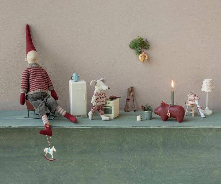 Maileg rocking horse Christmas ornament displayed with festive holiday decorations