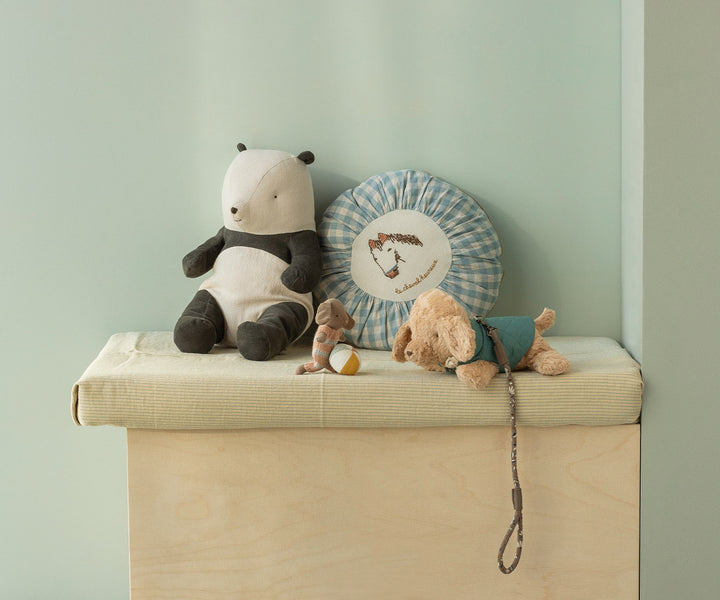 Maileg medium panda stuffed animal displayed on a nursery shelf. 