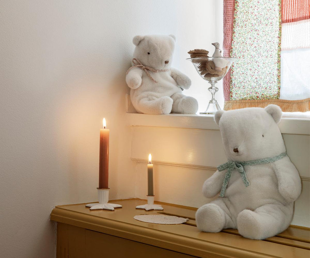 Maileg star candle holder styled in a festive Christmas display